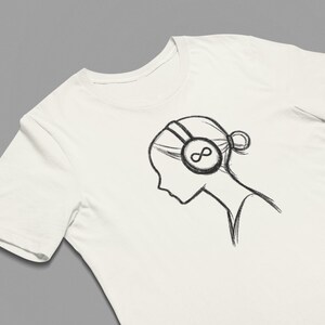 May include: Cream-coloured t-shirt with a black sketch of a person wearing headphones, the headphones featuring an infinity symbol. The design is a simple line drawing, with the person's hair in a bun.