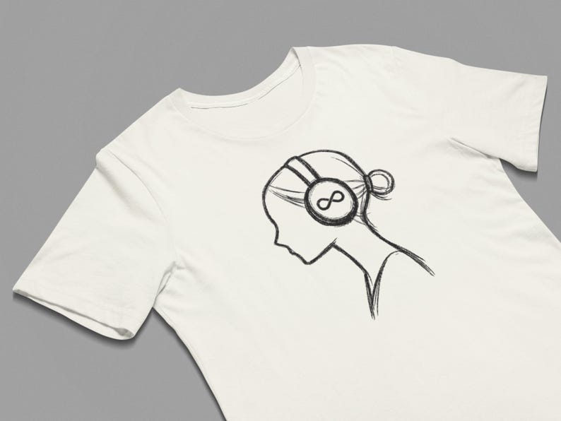 May include: Cream-coloured t-shirt with a black sketch of a person wearing headphones, the headphones featuring an infinity symbol. The design is a simple line drawing, with the person's hair in a bun.