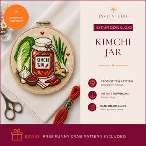 May include: A cross stitch pattern featuring a jar of kimchi, napa cabbage, green onions, ginger, garlic, and red chilli peppers. The text reads KIMCHI JAR. Includes a wooden embroidery hoop, red embroidery floss, and metal scissors on fabric.