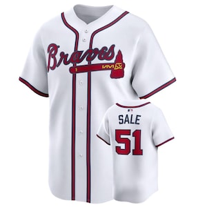 May include: A white ceramic mug with a black handle and the text "But First, Coffee" in a handwritten style. The mug is on a white surface. The mug is 4 inches tall.