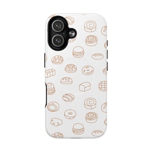 以下が含まれることがあります： 白の携帯電話ケース。茶色の線画で描かれたパン、ロールパン、ペストリーなどの焼き菓子が繰り返し描かれたパターン。ケースにはカメラの切り抜きと黒いサイドボタンが付いています。