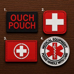 May include: Four rectangular and circular patches featuring medical themes. Patch 1 is black with red text OUCH POUCH. Patch 2 is a red square with a white cross. Patch 3 is a red rectangle with a white cross in a circle. Patch 4 is a white circle with a red star of life symbol and text MEDICAL EQUIPMENT PLEASE HANDLE WITH CARE.