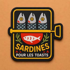 May include: A black and yellow sardine can-shaped magnet with three fish illustrations. The magnet has the words "SARDINES POUR LES TOASTS" in yellow and red. The background is a solid orange color.