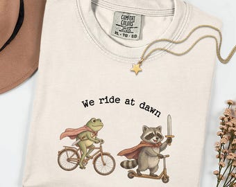 Funny Frog Raccoon Shirt, We Ride At Dawn Tee, Ren Faire Shirt, LARP Fantasy Shirt, Cottagecore Animal Shirt, Comfort Colors Graphic Tee