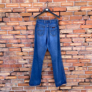 vintage 70s/80s blue medium wash bootcut yoke wrangler jeans / 27 s small image 2