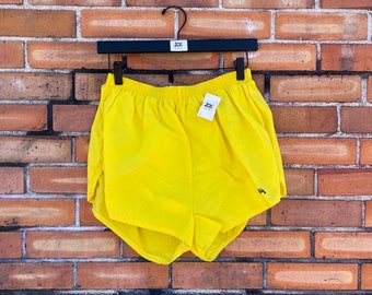 vintage 70s/80s yellow dolfin running shorts / s m small medium