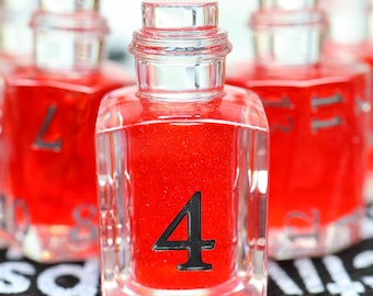 Juego de dados con núcleo líquido de botella de poción / 7 dados rojos de poción con borde afilado para D&D con tinta plateada / Dados poliédricos para D&D, juegos de rol de mesa, regalos para él