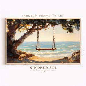 Peut inclure: Une impression d'art encadrée rectangulaire intitulée PREMIUM FRAME TV ART par KINDRED SOL fine art prints. La peinture représente un paysage à l'huile avec une balançoire en bois suspendue à une branche d'arbre surplombant une plage océanique.