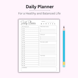 May include: A white daily planner with a schedule, priorities, focus, to-do list, and notes sections. The planner has the text "Daily Planner" and "For a Healthy and Balanced Life". A blue pencil is next to the planner.