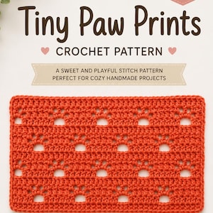 May include: An orange crochet pattern with paw print cutouts. The text "Tiny Paw Prints CROCHET PATTERN" is displayed above the crochet piece. The image also includes the text "A sweet and playful stitch pattern perfect for cozy handmade projects."