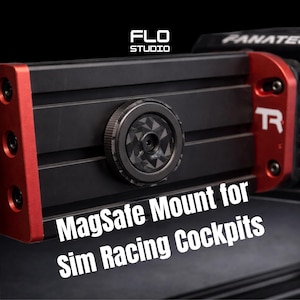 Puede incluir: Soporte MagSafe negro y rojo para cabinas de simulación de carreras. El soporte presenta una base negra con detalles rojos y el texto "MagSafe Mount for Sim Racing Cockpits". La imagen también incluye el logotipo "FLO STUDIO".