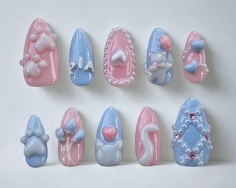 Unghie finte a forma di zampa di gatto rosa e blu, fatte a mano per gli amanti degli animali.