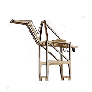 May include: A wooden model of a crane with a brown wooden base and a brown wooden arm. The crane is made of wood and has a simple design.