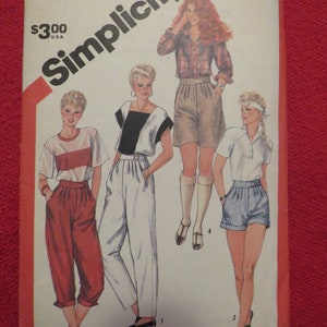 May include: Simplicity sewing pattern number 5938 for women's shorts. The pattern includes four different styles of shorts, all with a high waist. The pattern is for sizes 8-24 and is priced at £3.00.