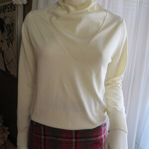 CREAM-top met lange mouwen uit de jaren 80 van GIVENCHY Sport/Bullocks: maat 36
