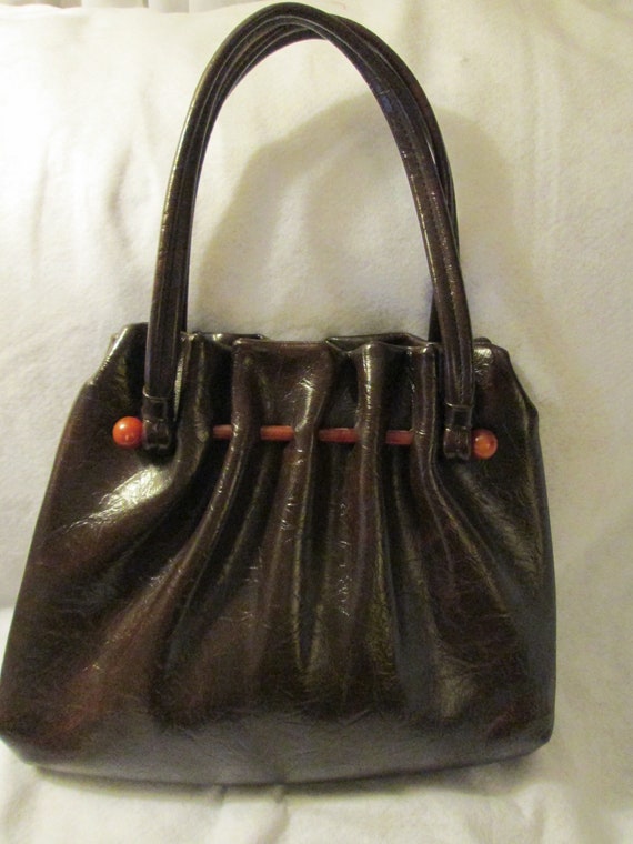 Vintage Dark BROWN VINYL HANDBAG With Lucite Bone 