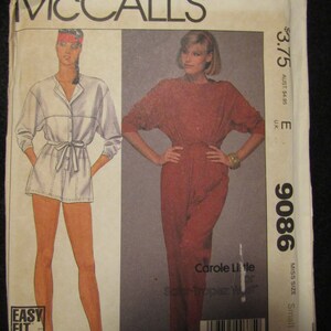 May include: A sewing pattern for a jumpsuit with a white top and red pants. The pattern is from McCall's and is number 9086. The pattern is for a miss size small. The pattern is called "Easy Fit" and is designed by Carole Little.