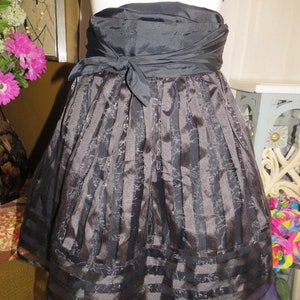 A BLACK Short Gathered POLYESTER SKIRT By Betsey Johnson----Size 6