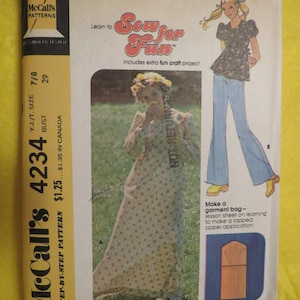 May include: A vintage McCall's sewing pattern for a long dress and a top with a lapped zipper application. The pattern is for size 7/8 and includes a step-by-step guide. The pattern cover features a woman wearing a long dress and another woman wearing a top and jeans. The text on the cover reads "Sew for Fun" and "includes extra fun craft project".