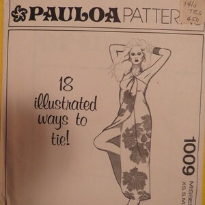 May include: A sewing pattern for a maxi dress with a floral print. The pattern is called "PAULOA PATTER" and the number is 1009. The pattern includes 18 illustrated ways to tie the dress.