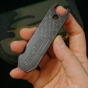 Abrebotellas EDC de titanio Wanersen, multiherramienta 3 en 1, palanca y destornillador.