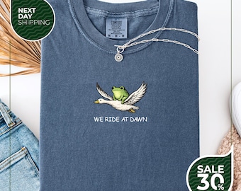 Comfort Colors® We Ride at Dawn Shirt | Funny Frog and Goose Tee | Embroidered Comfort Colors | Chaotic Animal Shirt | Whimsical Gamer Gift