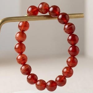 Pulsera de cuentas de cornalina, pulsera elástica de cristal de cornalina, joyería curativa de piedras preciosas rojo anaranjadas, piedra energética del chakra sacro