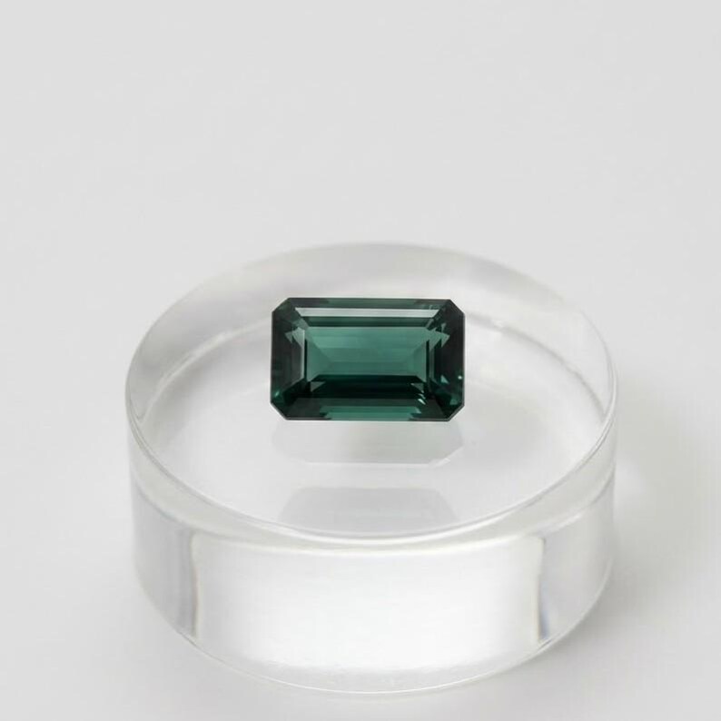 Genuine loose emerald stone in classic emerald cut featuring a vibrant green color, suitable for engagement rings, statement jewelry, birthstone gifts and handmade fine jewelry creations.