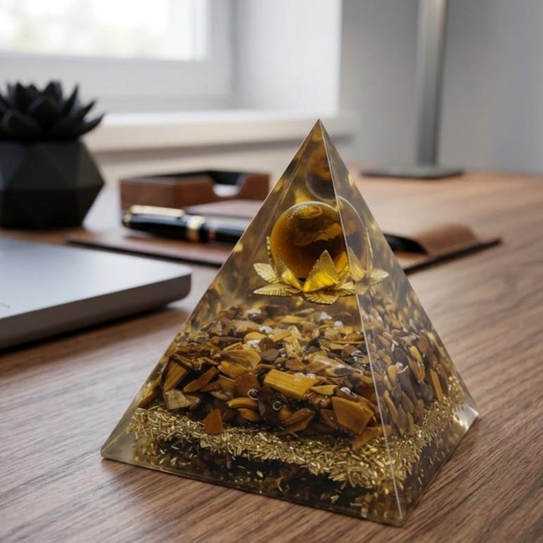 Tiger eye healing crystal pyramid known for prosperity, abundance, and protection, perfect for office desk decor and business success energy.