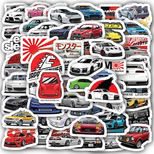 May include: A collection of car-themed stickers featuring various sports cars in different colors and designs. Some stickers include Japanese text and imagery, such as the rising sun and the word "Monster". The stickers are die-cut and ready to peel and stick.