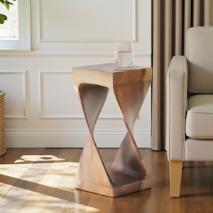 May include: A light brown wooden side table with a unique hourglass design. The table has a square top and base, with a twisted, open center. A glass of water sits on top. The table is approximately 20 inches tall.