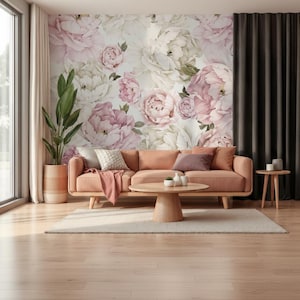 May include: A white ceramic mug with a black handle and the text "But First, Coffee" in a handwritten style. The mug is on a white surface. The mug is approximately 4 inches tall.