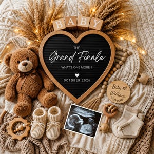 May include: A heartwarming announcement featuring a teddy bear, baby booties, and a heart-shaped sign that reads "The Grand Finale." The ultrasound image and wooden accents add a rustic touch, with the text "October 2026" indicating an upcoming event.