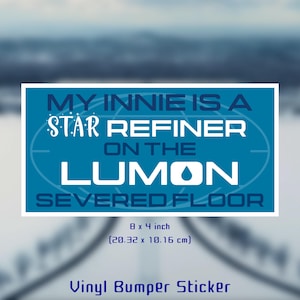 May include: Blue and white vinyl bumper sticker with the text "My Innie is a Star Refiner on the Lumon Severed Floor". The sticker measures 8 inches by 4 inches (20.32 cm x 10.16 cm).