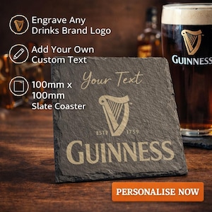 May include: A square slate coaster, 100mm x 100mm, with the Guinness logo and text. The coaster is dark gray with engraved gold lettering. The text "Your Text" is above the logo. The words "Engrave Any Drinks Brand Logo" and "Add Your Own Custom Text" are also visible.