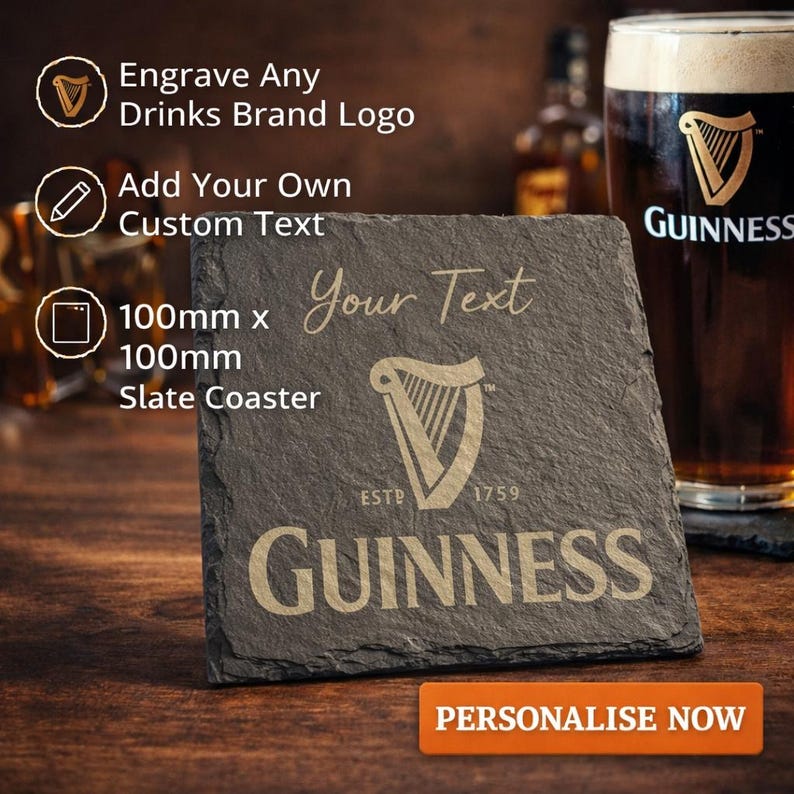 May include: A square slate coaster, 100mm x 100mm, with the Guinness logo and text. The coaster is dark gray with engraved gold lettering. The text "Your Text" is above the logo. The words "Engrave Any Drinks Brand Logo" and "Add Your Own Custom Text" are also visible.