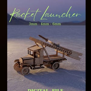 Puede incluir: Un modelo de camión de madera con un mecanismo de lanzacohetes, que presenta el texto "Rocket Launcher" y "3mm - 4mm - 6mm". El modelo incluye un riel de lanzamiento y un pequeño proyectil, construido con piezas de madera clara con detalles cortados con láser.