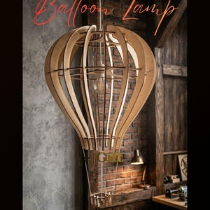 May include: A hanging pendant lamp shaped like a hot air balloon, constructed from light-colored wooden slats. The text "Balloon Lamp" appears at the top, "Gift" in the center, and "3mm - 4mm - 6mm DIGITAL FILE Instant Download" at the bottom.