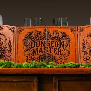 May include: A four-panel wooden Dungeon Master screen with a burnt orange finish. The center panels feature the text Dungeon Master with dragon illustrations, while the side panels display polyhedral dice and flame motifs. Clear acrylic tabs are visible.