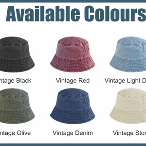 May include: Image showing six bucket hats in various colors: Vintage Black, Vintage Red, Vintage Light Denim, Vintage Olive, Vintage Denim, and Vintage Stone. The text "Available Colours" is at the top.