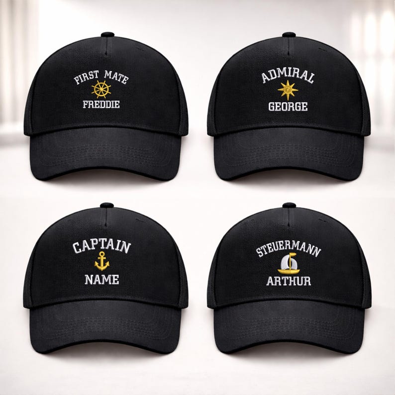 May include: Four black baseball caps with nautical-themed designs. Each cap features white and gold text with phrases like "FIRST MATE" and "CAPTAIN", along with personalized names. The caps have a classic, curved brim.