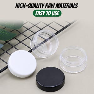 May include: Two small, clear, round plastic cosmetic jars with screw-top lids, one in solid white and one in solid black. The text HIGH-QUALITY RAW MATERIALS and EASY TO USE is visible at the top of the image above the containers.