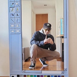 May include: A rectangular mirror designed to resemble the classic Windows Paint application interface. The mirror features a light blue frame with the program's title bar, menu options, and color palette. Text includes "untitled - Paint" and "For Help, click Help Topics on the Help Me".