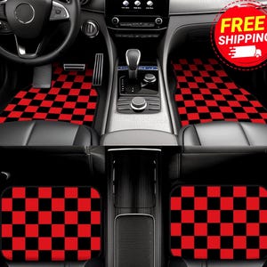 May include: A set of car floor mats featuring a bold red and black checkered pattern. The mats are installed in the front and rear footwells of a vehicle interior, covering the floor area with a consistent grid design of alternating squares.