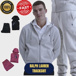 May include: A light gray zip-up hoodie and matching sweatpants set featuring a small dark logo on the chest and thigh. The set includes a white collared shirt underneath. Additional color options shown include black and maroon hoodie and pant sets.