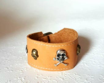 Gothic skull leather wristband, bracelet. Biker leather wristband, bracelet. Punk rock glamour. Leather wristband with skulls.