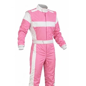 May include: Pink racing suit with white accents. The one-piece suit features a stand-up collar, a white stripe down the sides of the legs, and a white stripe across the chest. The suit has a white belt and white cuffs on the sleeves.