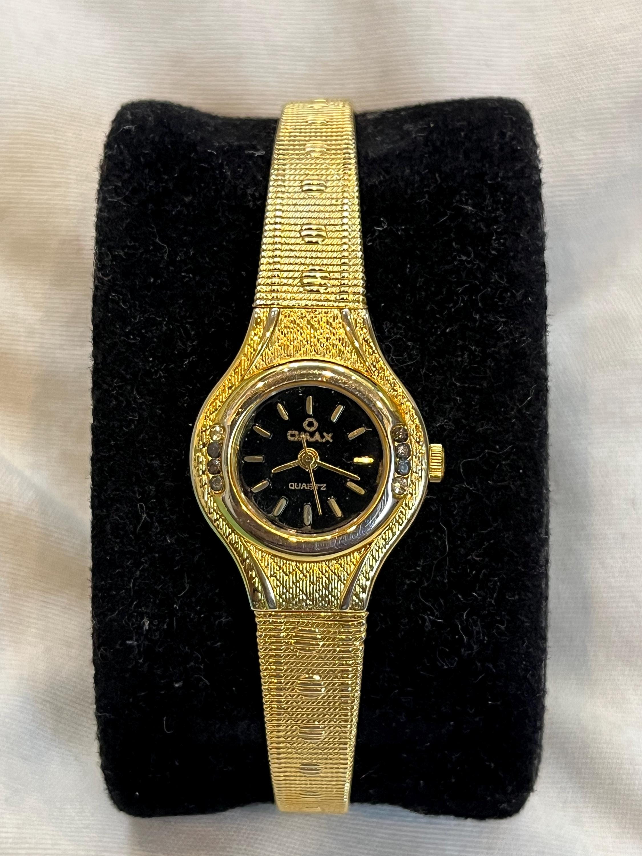 Omax vintage watch - Etsy 日本