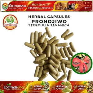 Può includere: Un mucchio di capsule alle erbe marrone chiaro etichettate come Pronojiwo Sterculia Javanica. L'immagine include un inserto circolare che mostra un fiore rosso con semi scuri e il testo HERBAL CAPSULES PRONOJIWO STERCULIA JAVANICA.