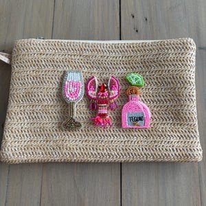 May include: A set of three ceramic mugs with a speckled, matte finish. The mugs are in shades of cream, light grey, and dark grey. Each mug has a simple, minimalist design, ideal for coffee or tea.